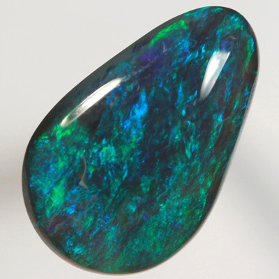 SOLID BLACK OPAL Full on green and blue fire always  SEE VIDEO